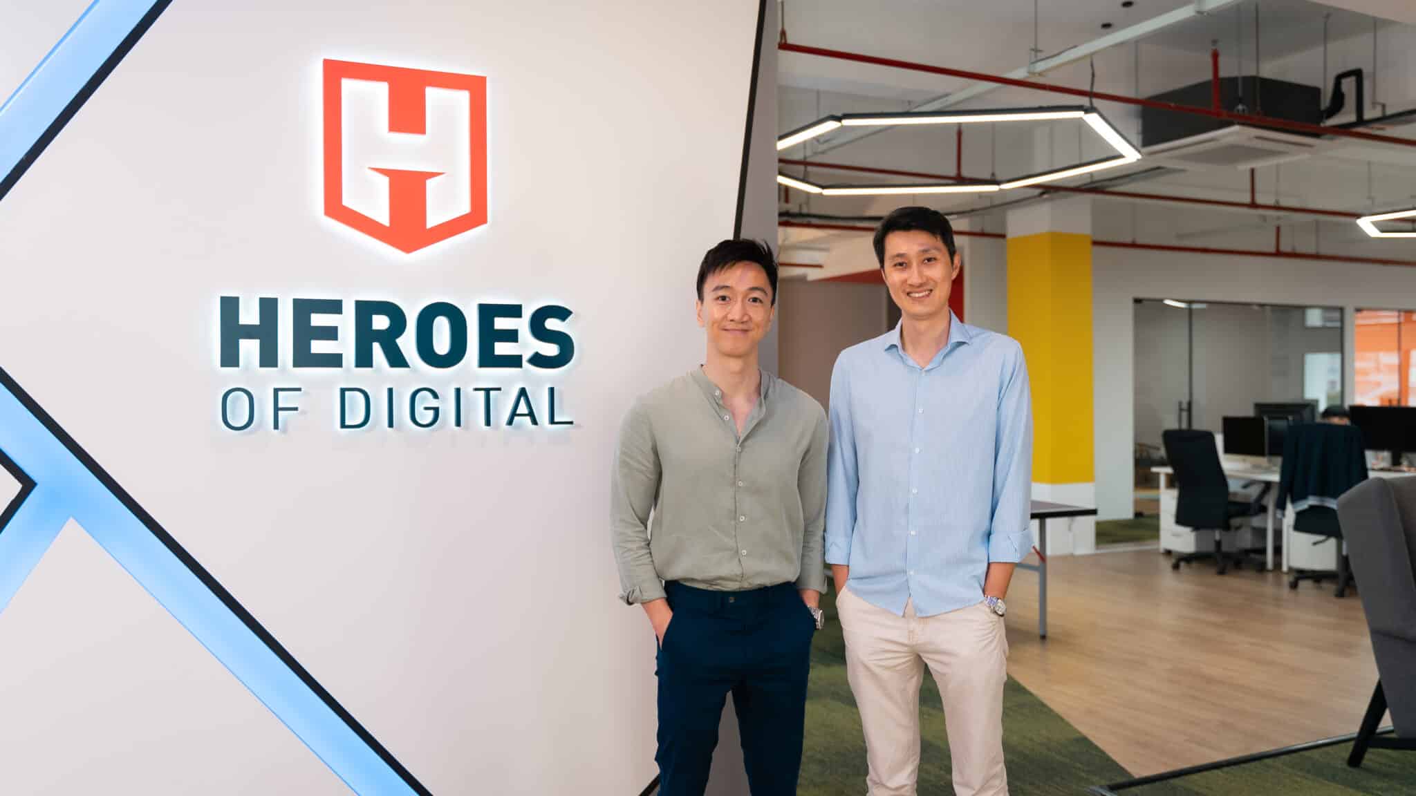 shane yuen and roy chen with the hod logo in office
